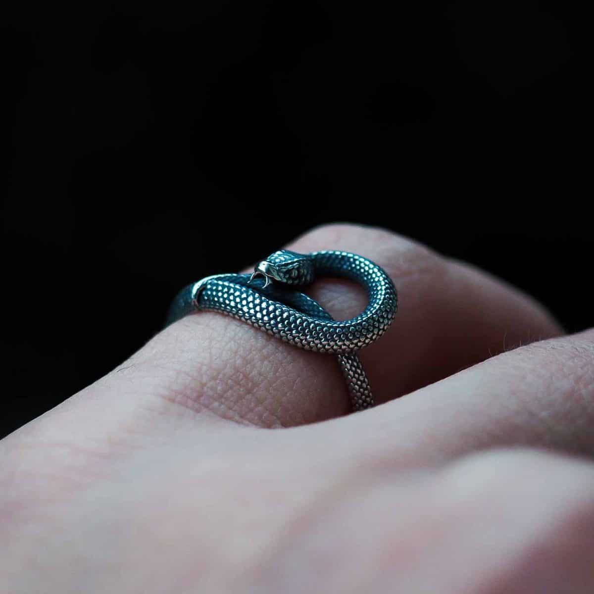 925 sterling silver Ouroboros snake ring on index finger